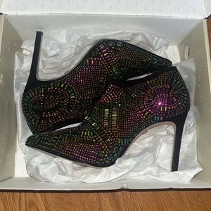 New in box. Never work. Thalia Sodi - Karmen ankle booties. 7.5